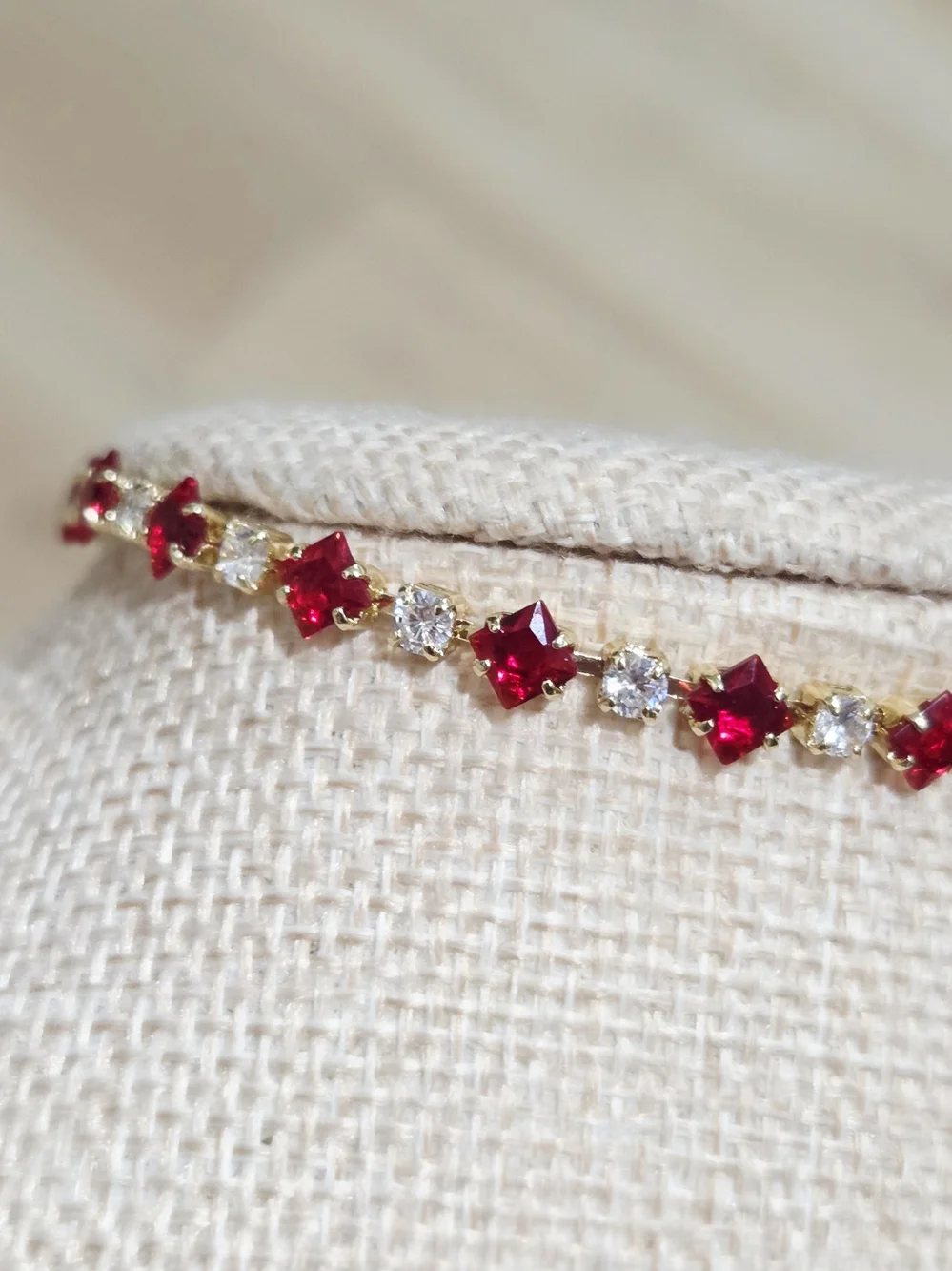 Gold-filled Bracelet with Red Gemstones and Clear Accents